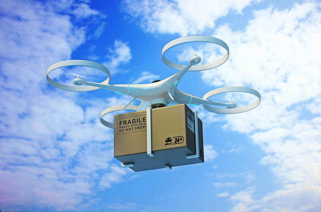 Drone carrying a parcel