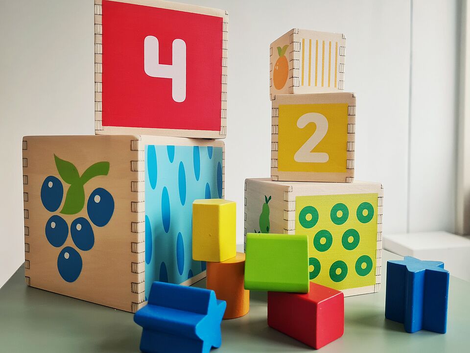 a wooden stacking tower for children